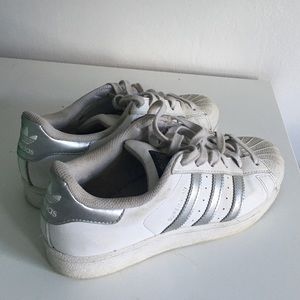 White Superstar Adidas With Silver Stripes